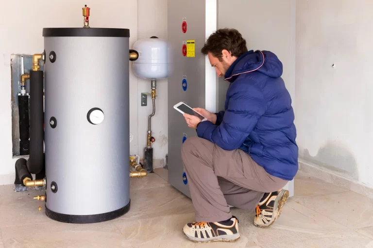 a technician installing boiler