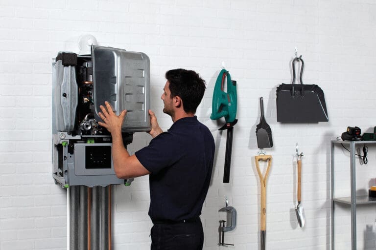 an hvac expert repairing home boiler system.