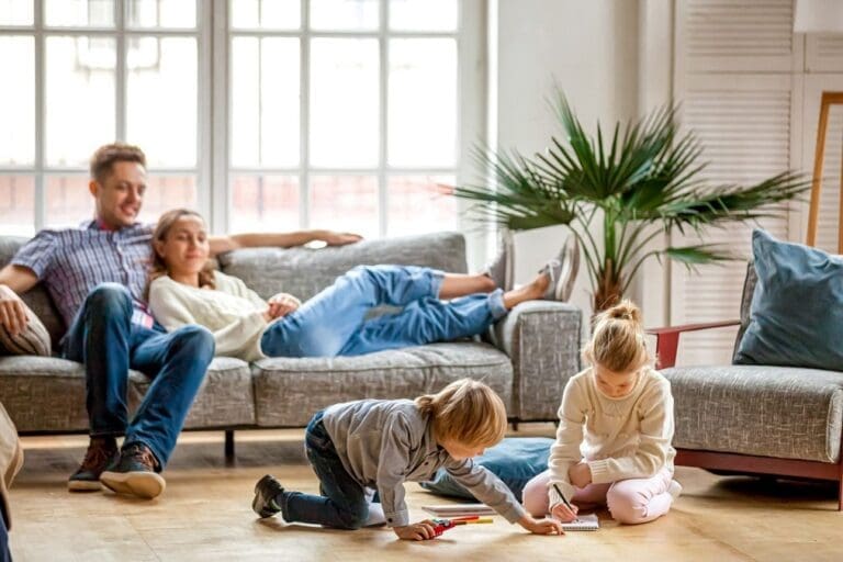 a family sitting in their home in a fresh environment.