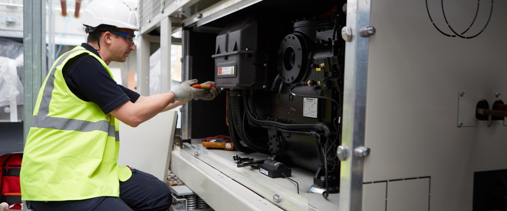 a technician repairing chiller