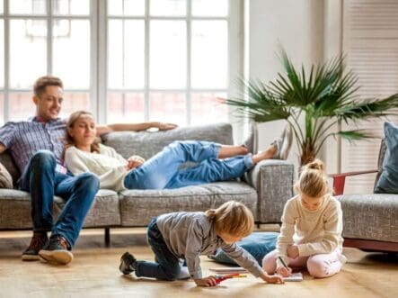 a family sitting in their home in a fresh environment.